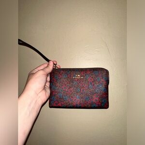 Coach Wristlet Floral, 6 1/2" (L) x 4" (H) x 1/2" (W)